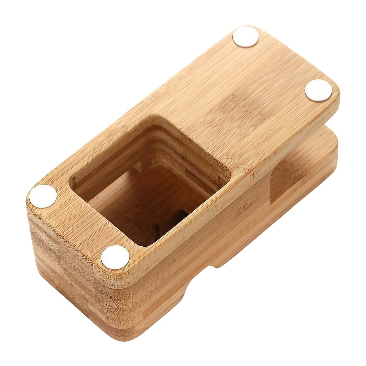 Un support en bois avec découpes rectangulaires et pieds en caoutchouc blanc.