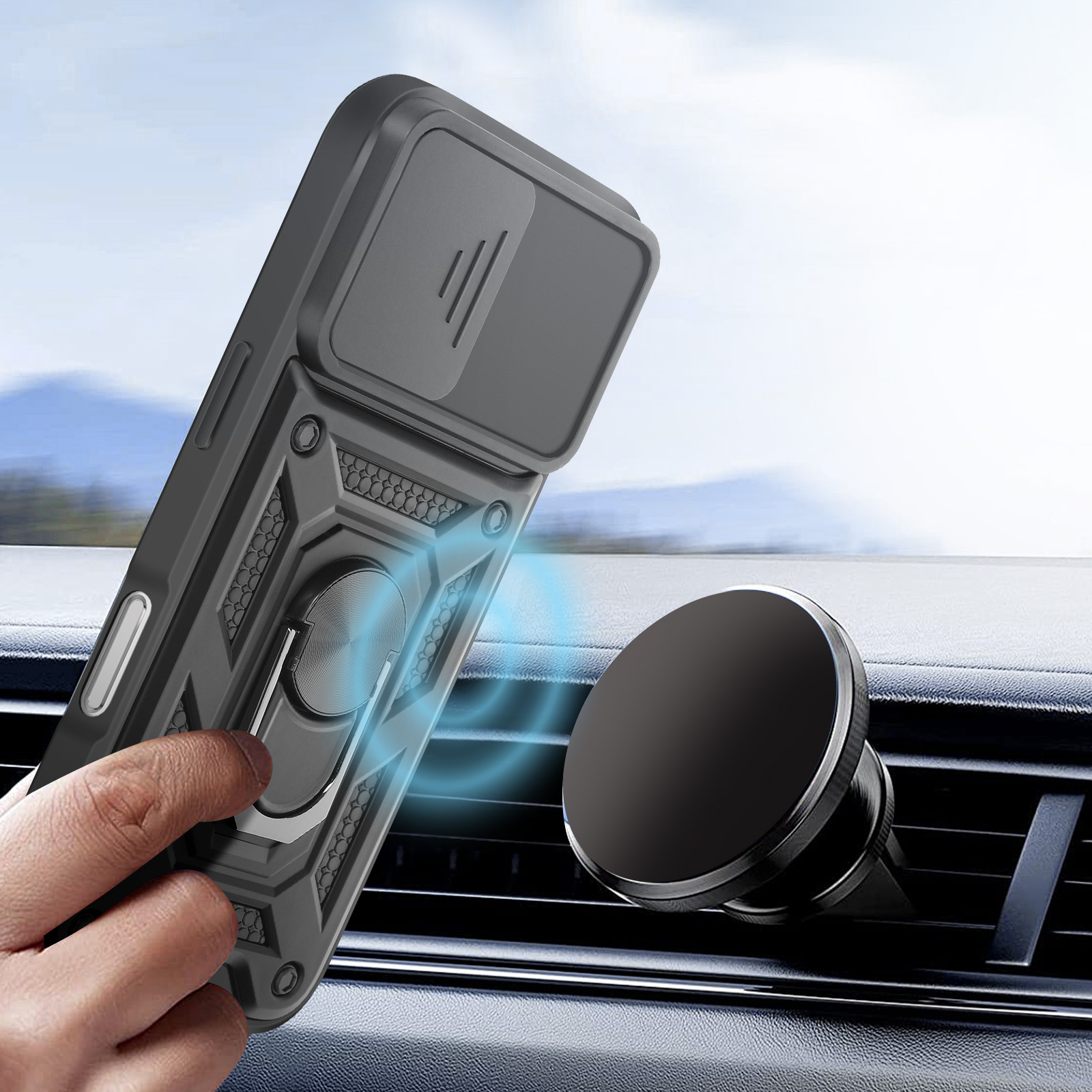 Mano tiene custodia nera per telefono con anello vicino al supporto di ventilazione per auto.