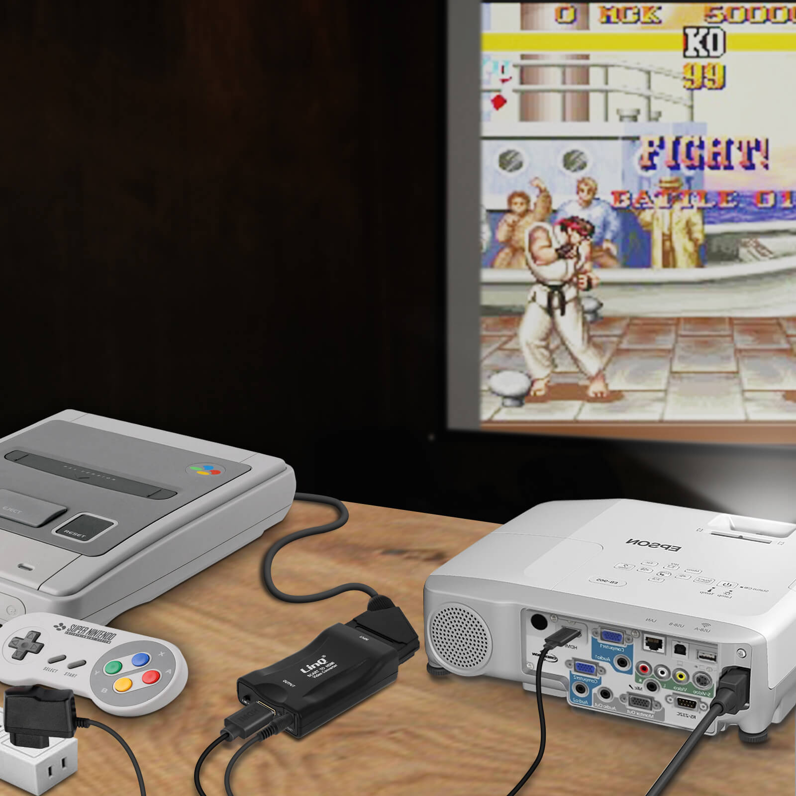 Ein SNES, Controller, Konverter und Projektor verbinden ein Videospiel.