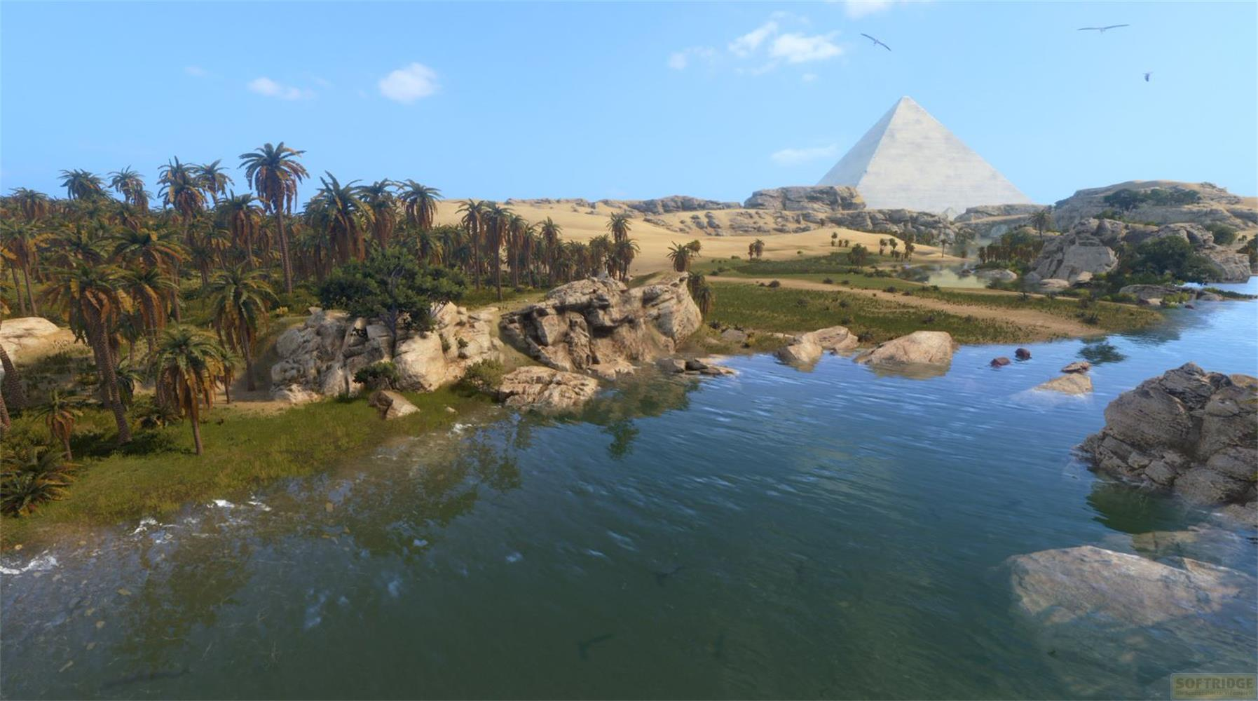 Eine Pyramide in einer Wüstenlandschaft mit Palmen und einem Fluss.