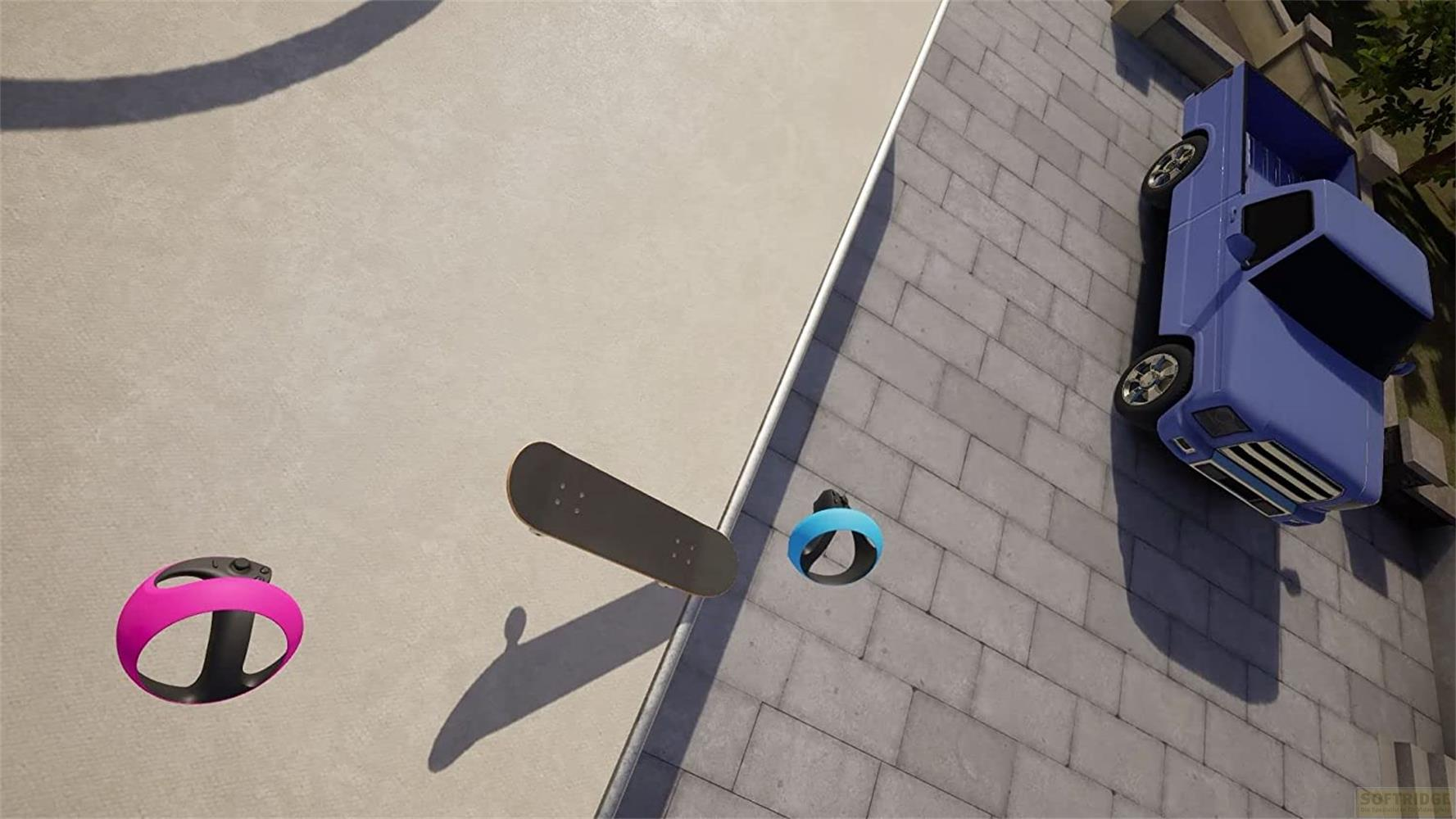 Un camion blu parcheggiato vicino a un muro. Uno skateboard e controller a terra.