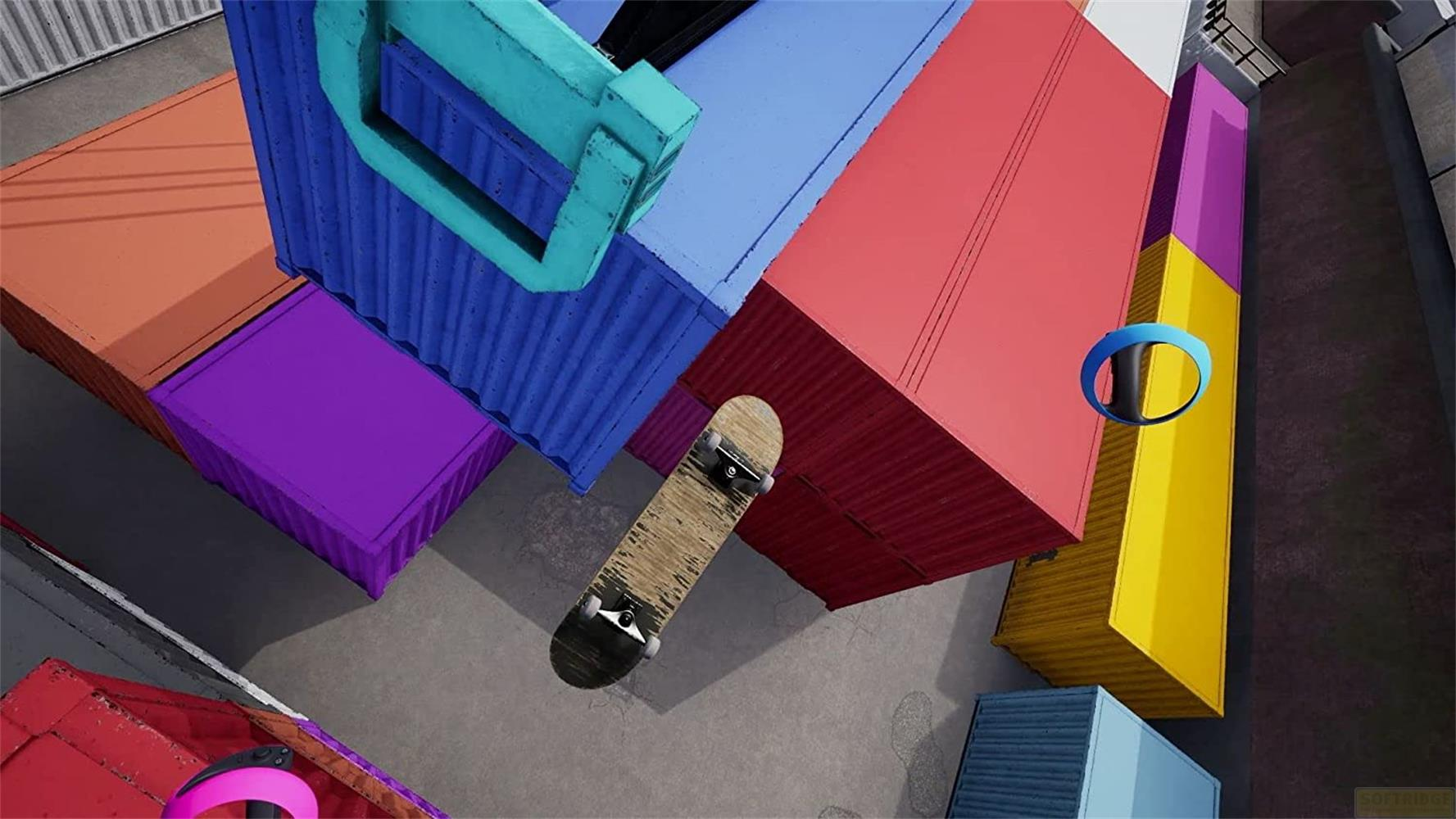 Uno skateboard poggia su una pila di container colorati in uno skatepark.