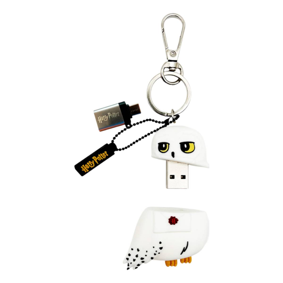 Un porte-clés clé USB Hedwig Harry Potter avec clip et anneau argentés.
