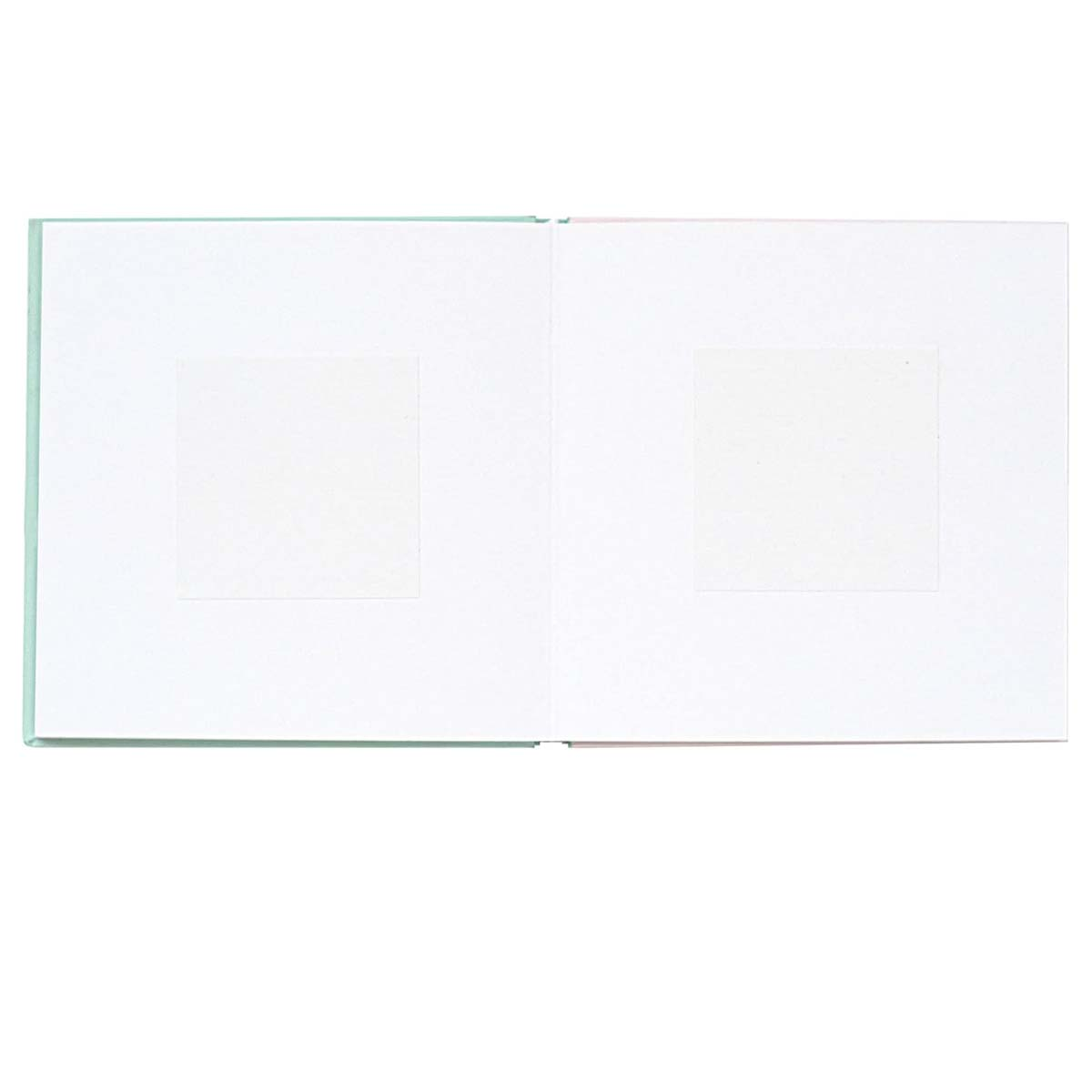 Un livre ouvert avec des pages vierges et deux carrés marqués.