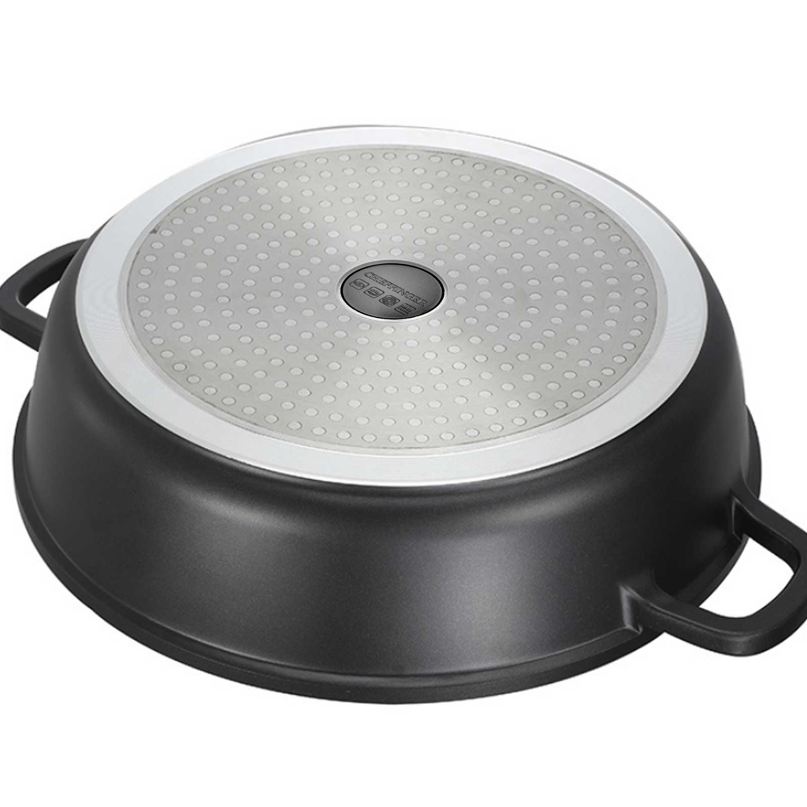 Parte inferior de una olla negra con tapa gris claro con patrones circulares.