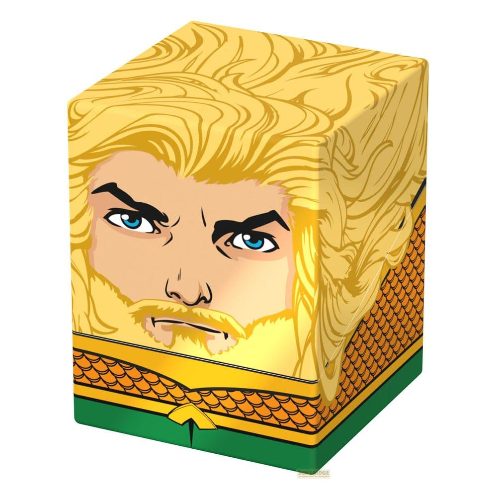 Un cube représentant le visage d'Aquaman, cheveux dorés, base verte.