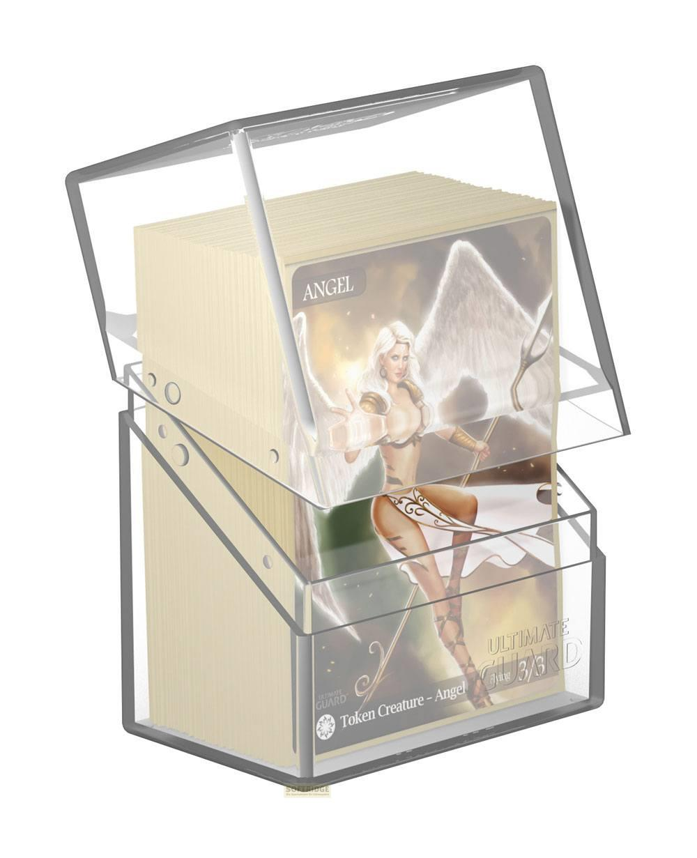 Boîte à cartes transparente avec un jeton ange. Pile de cartes.