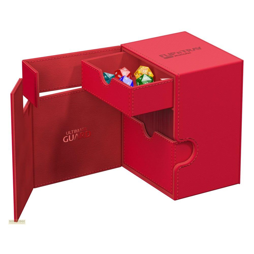 Boîte de rangement rouge avec tiroir, remplie de dés.