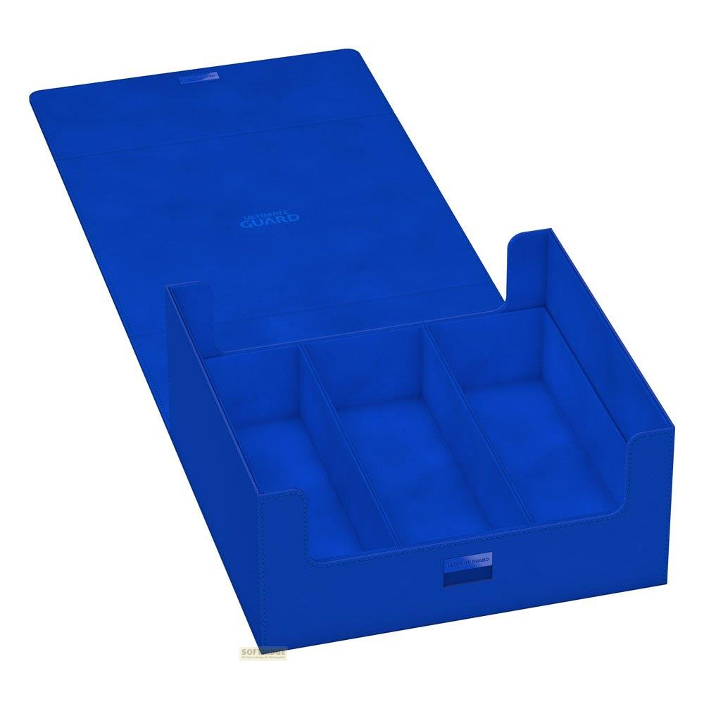 Une boîte de rangement bleue à trois compartiments et couvercle ouvert.