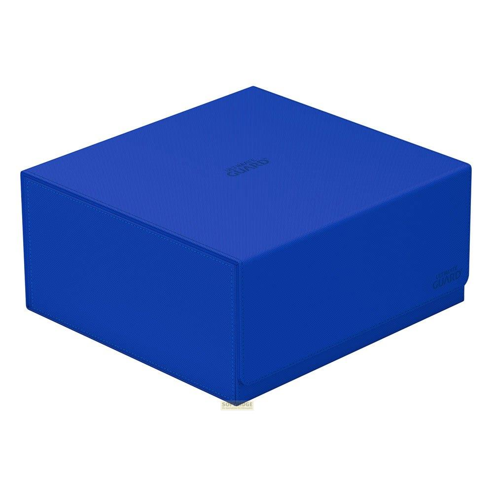Une boîte de rangement bleue avec le logo 'Ultimate Guard' est présentée sur fond blanc.