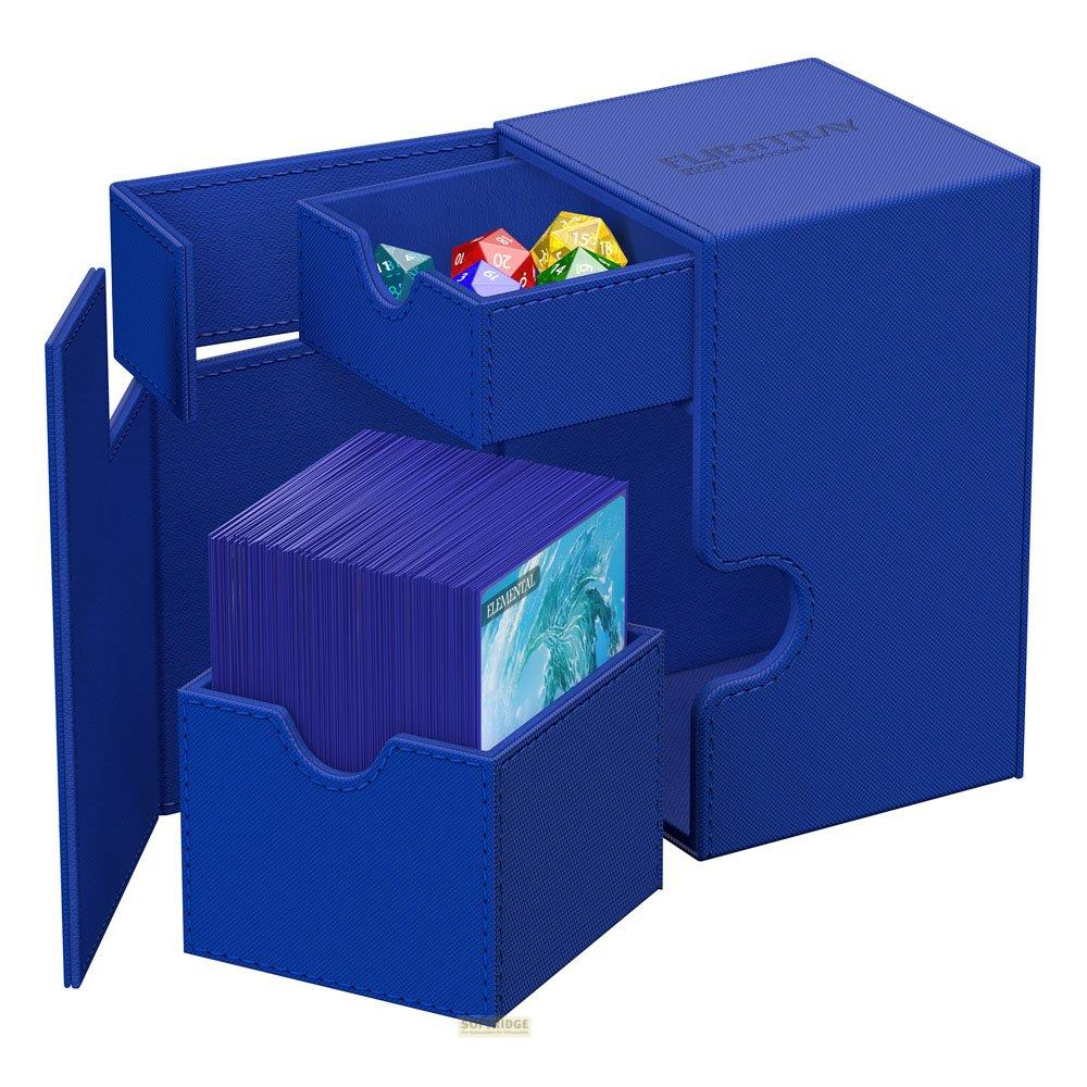 Boîte à deck bleue avec piles de cartes et dés. L'avant a une pile.