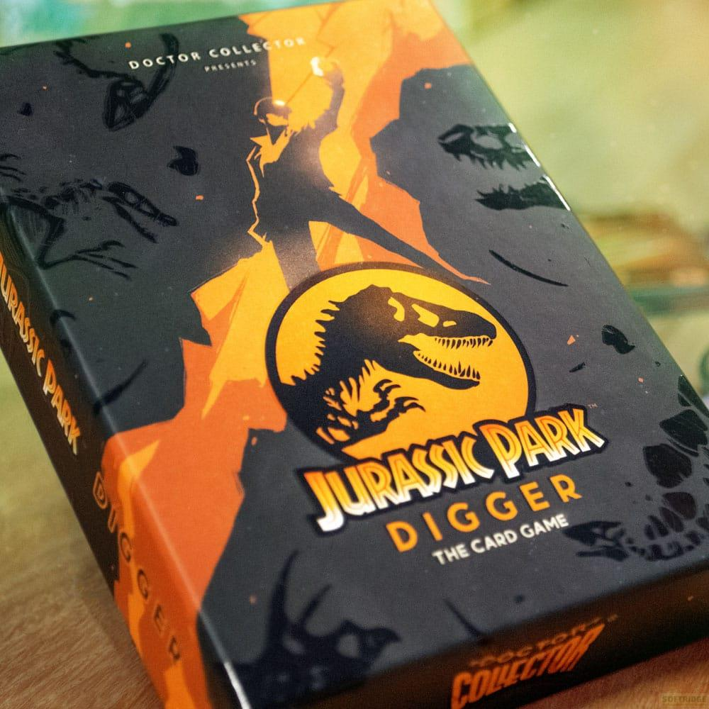Boîte de jeu de cartes Jurassic Park Digger avec graphiques de dinosaures.