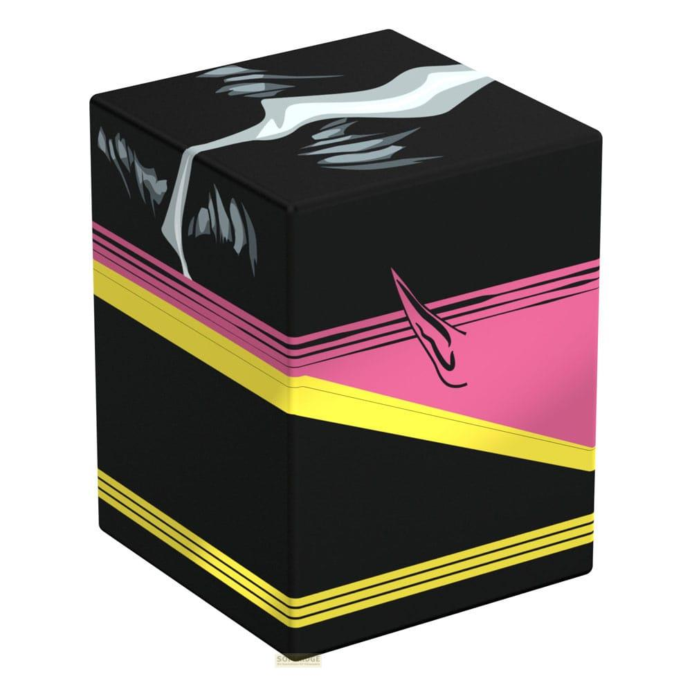 Schwarze Box mit pinken und gelben Streifen und weißer Grafik.