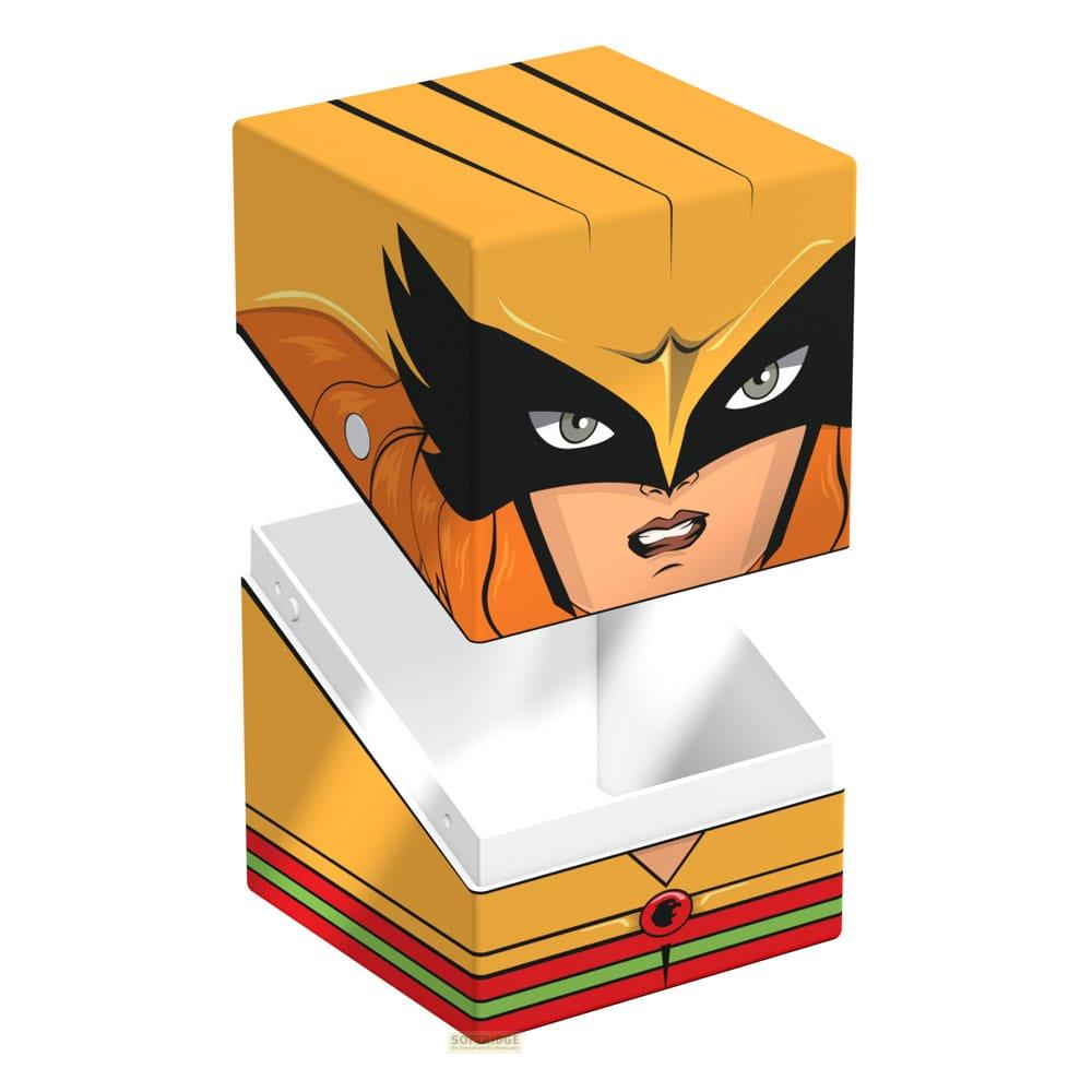 Eine offene Box mit einem gelben Deckel, der ein Gesicht zeigt.