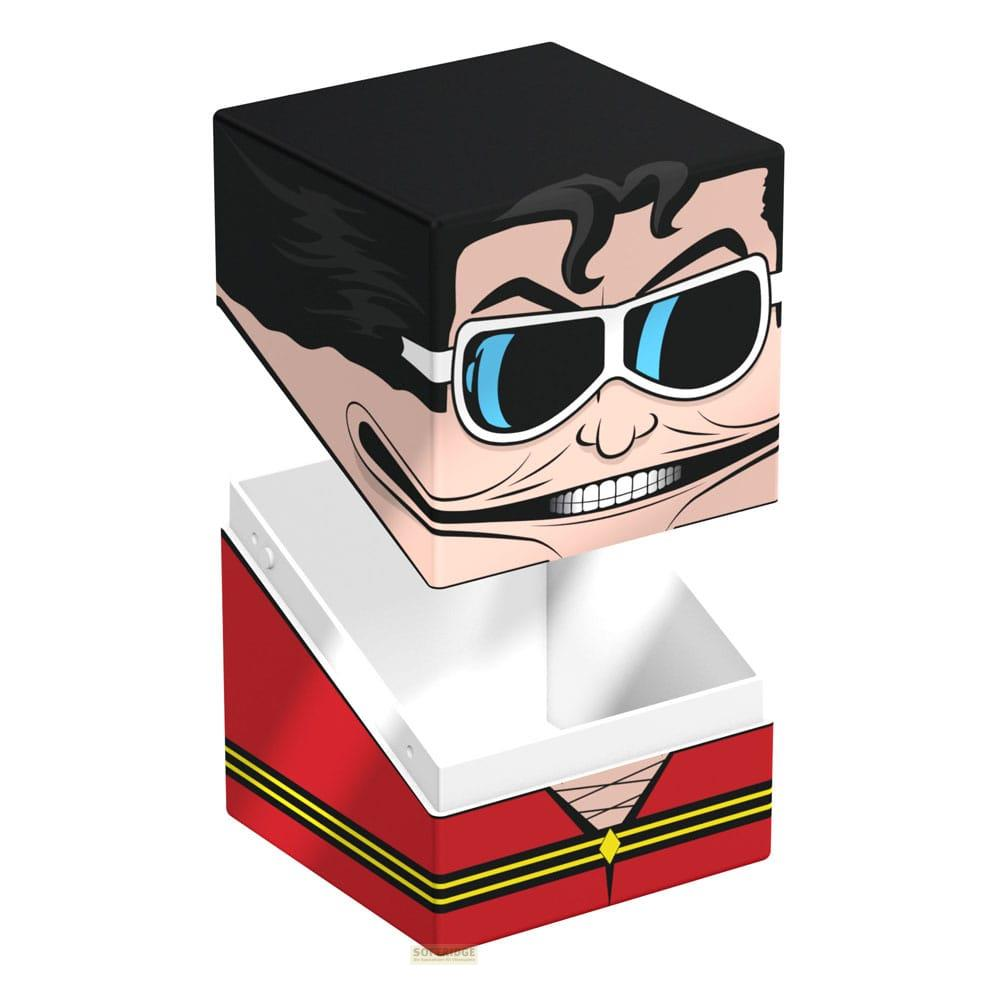 Une boîte avec un visage de dessin animé et un col rouge, séparée.