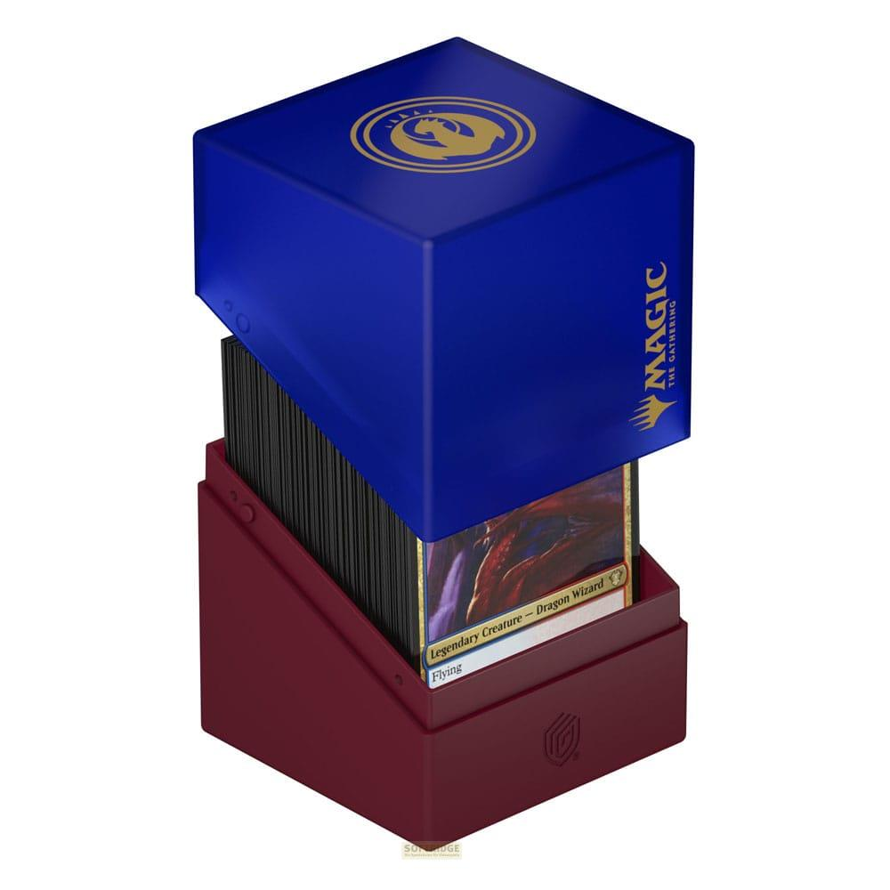 Une boîte de deck Magic: The Gathering bleue avec une base rouge, contenant des cartes.