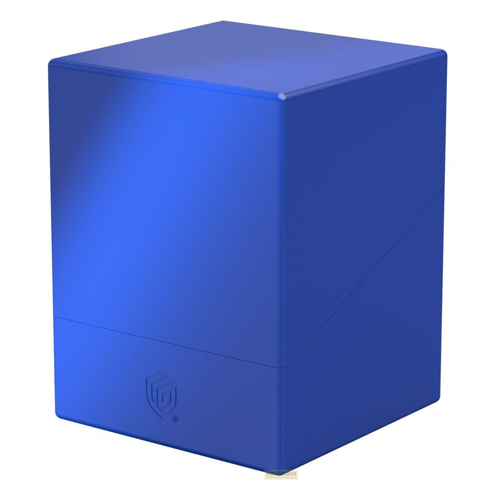 Un cube bleu avec un avant biseauté et un logo en bas.