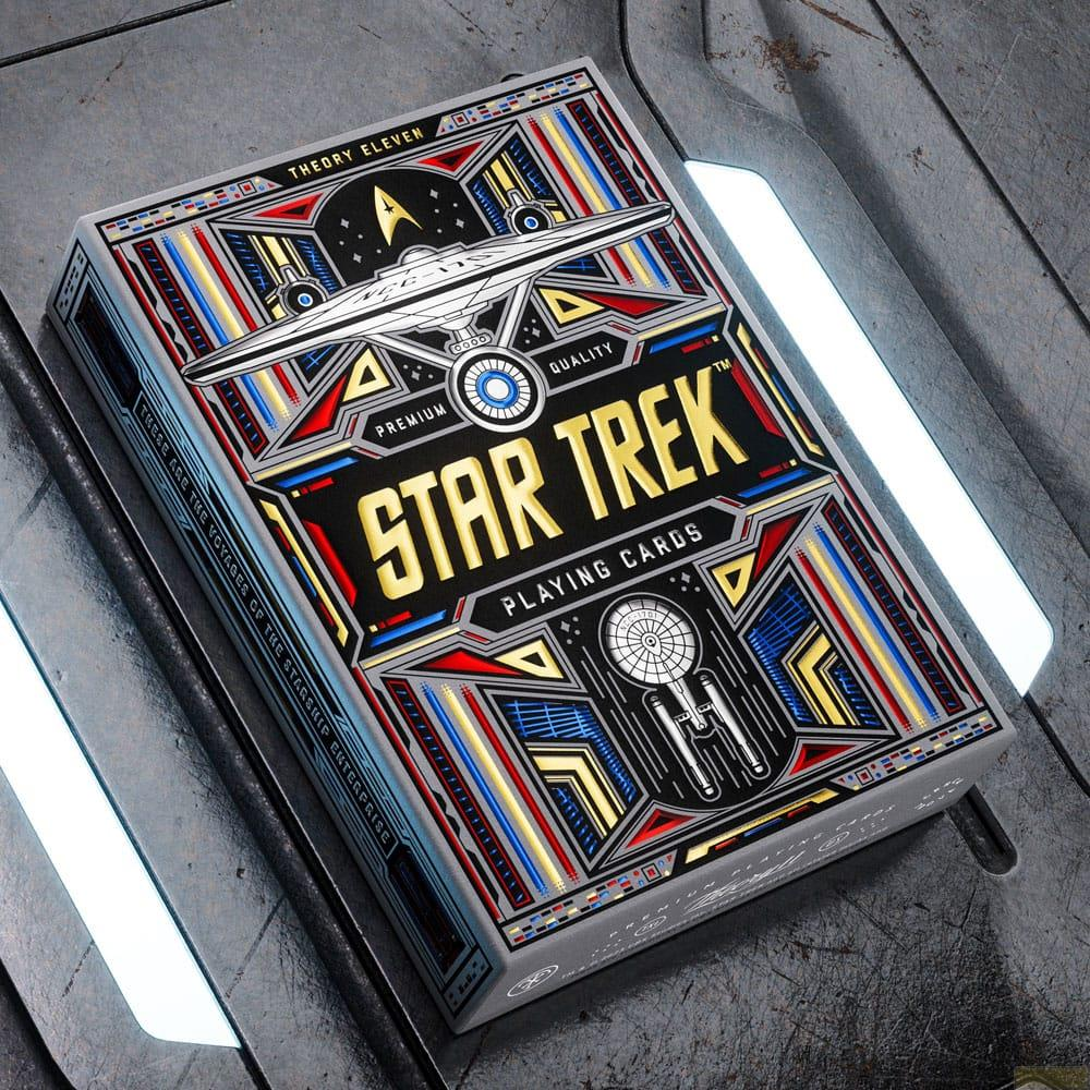 Scatola di carte da gioco Star Trek con Enterprise, logo Starfleet e motivi geometrici.