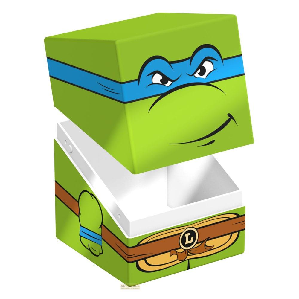 Une boîte verte à l'effigie de Leonardo des Tortues Ninja, avec bandeau bleu.