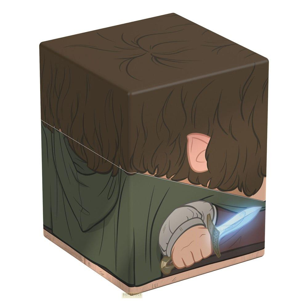 Un cube marron montre un personnage aux cheveux bruns, robe verte et dague lumineuse.