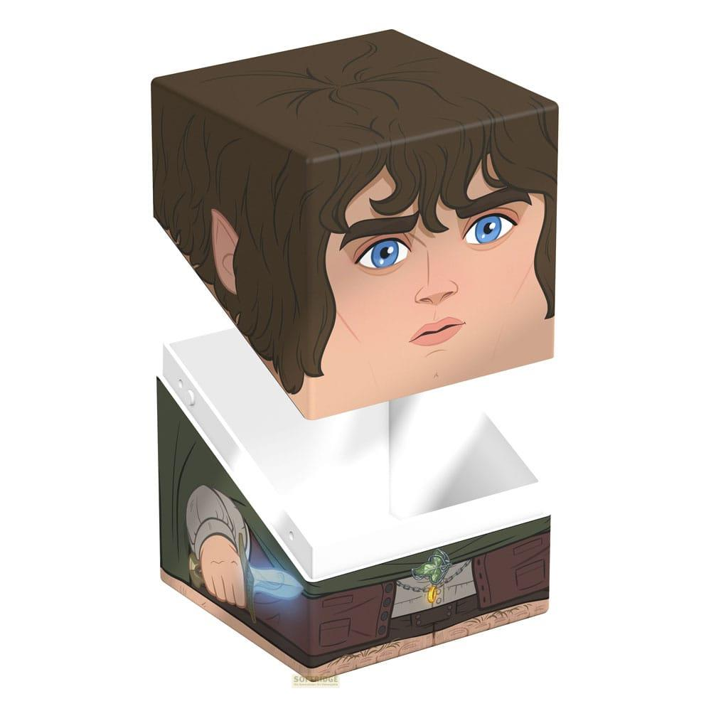 Un cube représente un visage de dessin animé aux cheveux bruns et aux yeux bleus. En dessous, les vêtements d'un personnage.
