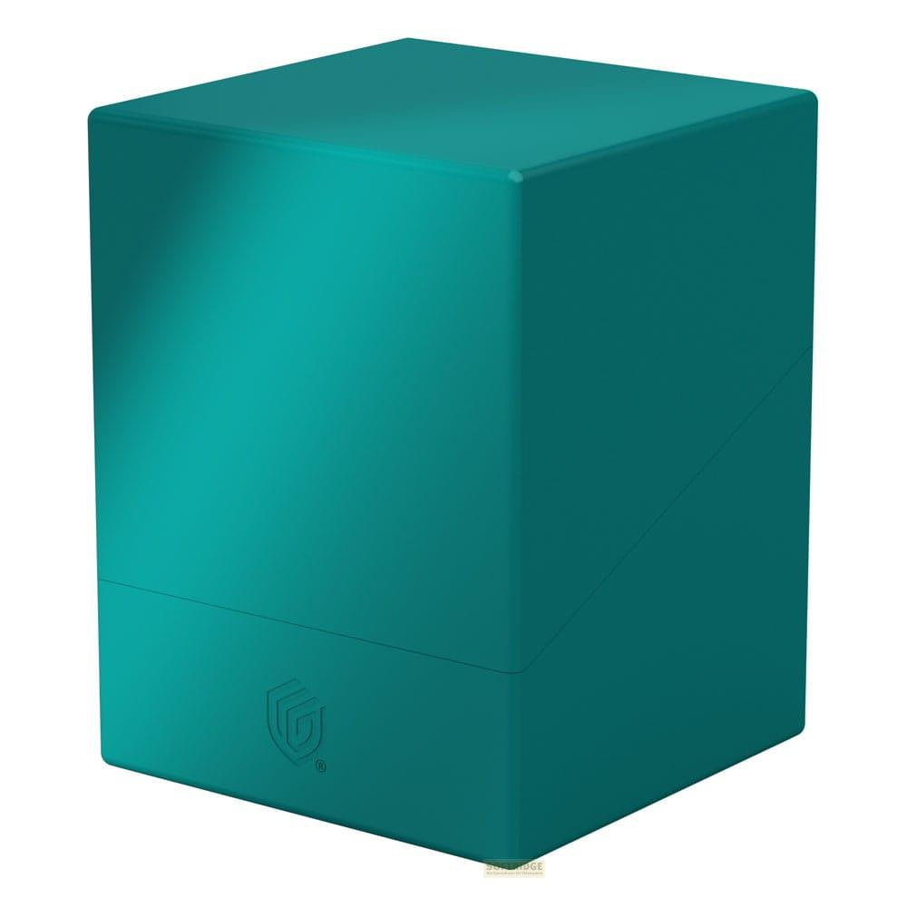 Una scatola a forma di cubo turchese con logo frontale.