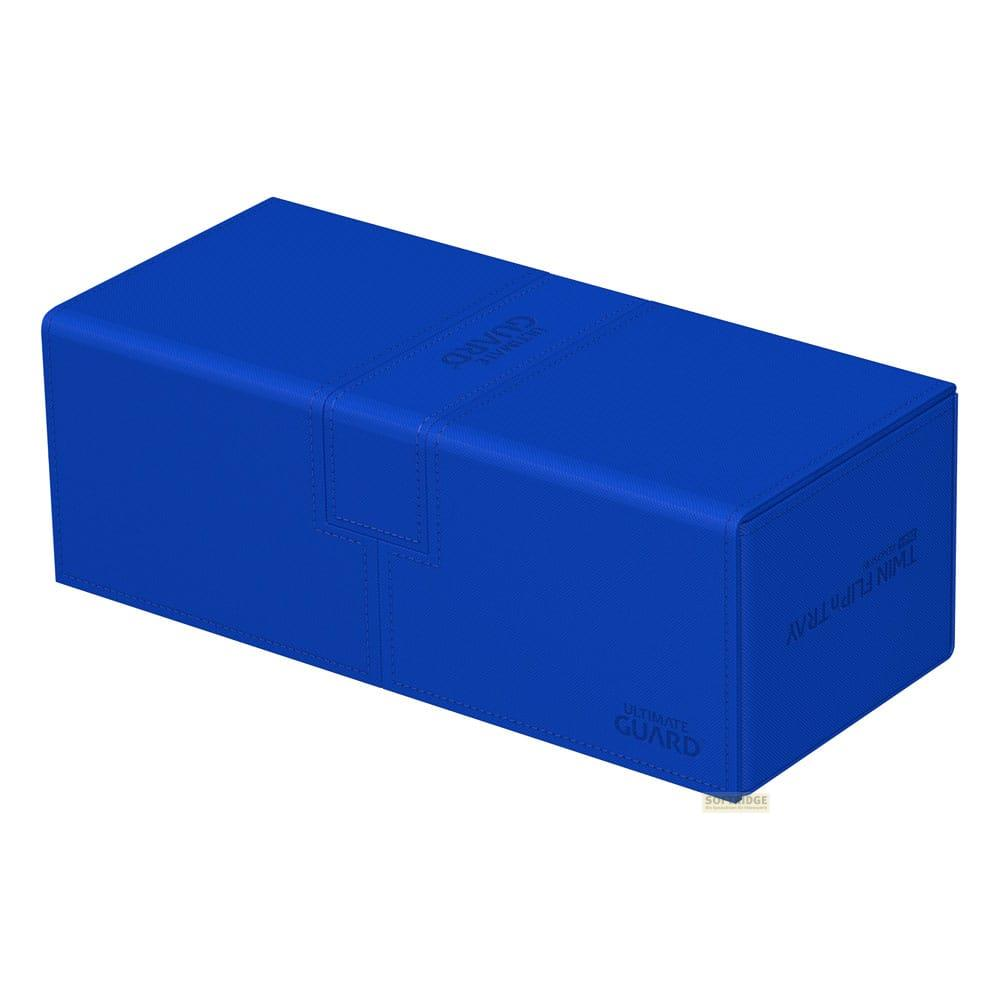 Una scatola blu etichettata Ultimate Guard Twin Flip-Tray.