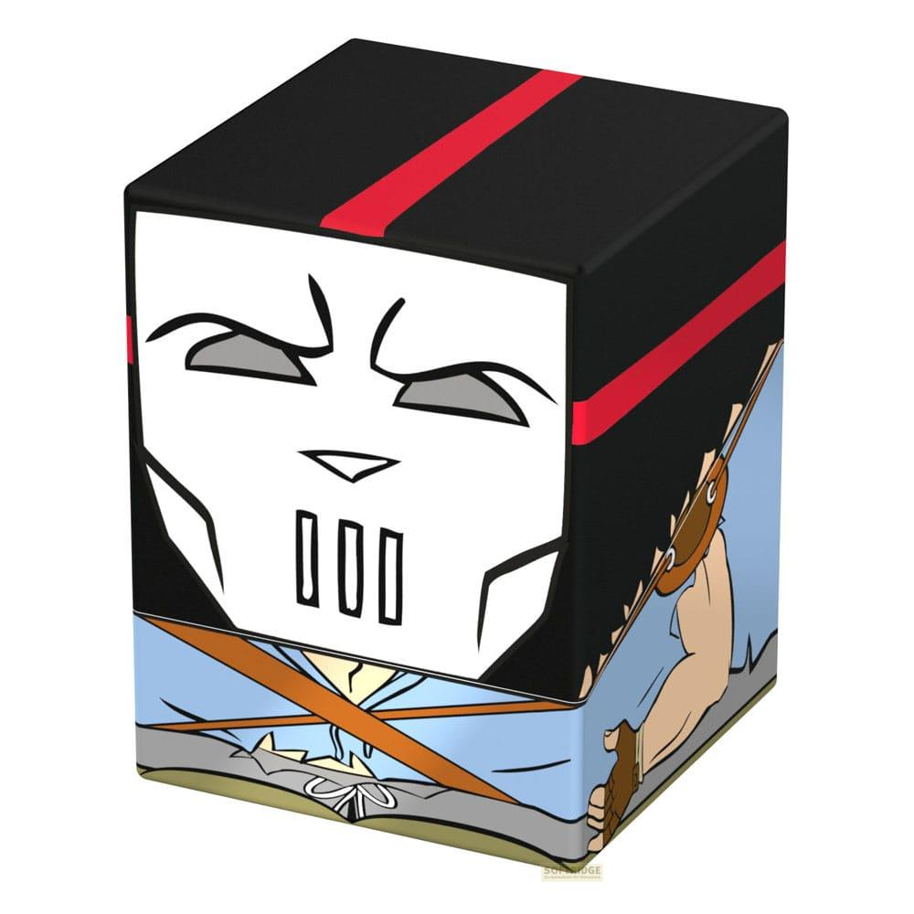 Un cube avec un visage de dessin animé, noir à rayures rouges et portant une chemise bleue.