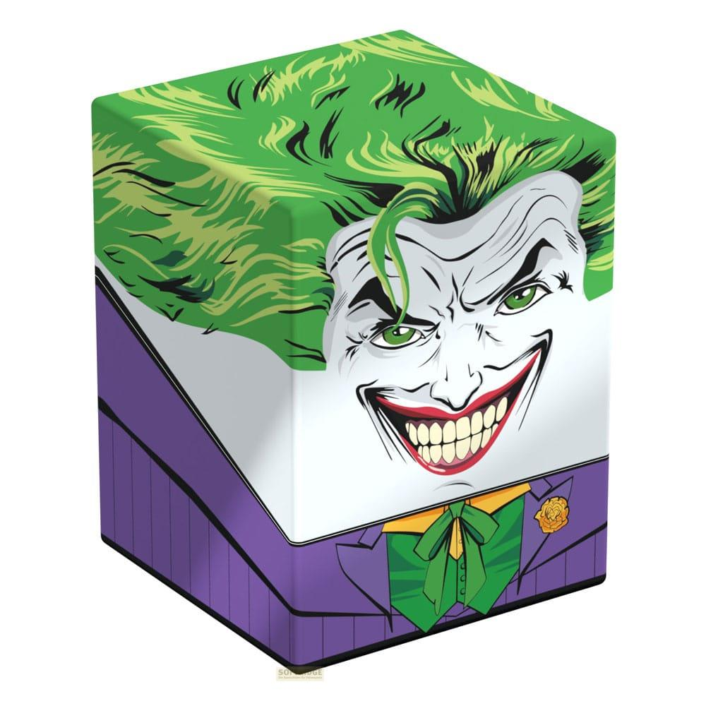 Un cubo con il volto del Joker, completo viola e capelli verdi.