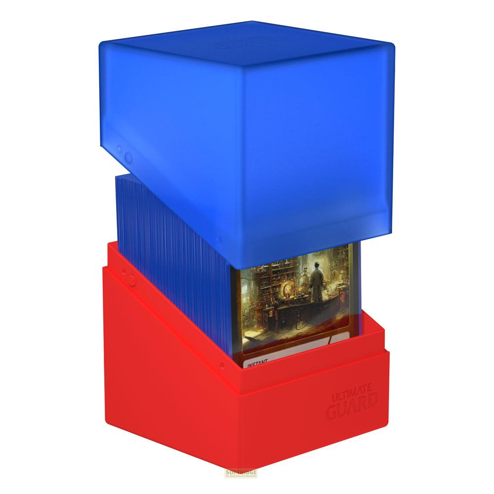 Portamazzi rosso con coperchio blu, contiene carte con arte fantasy. Logo Ultimate Guard.