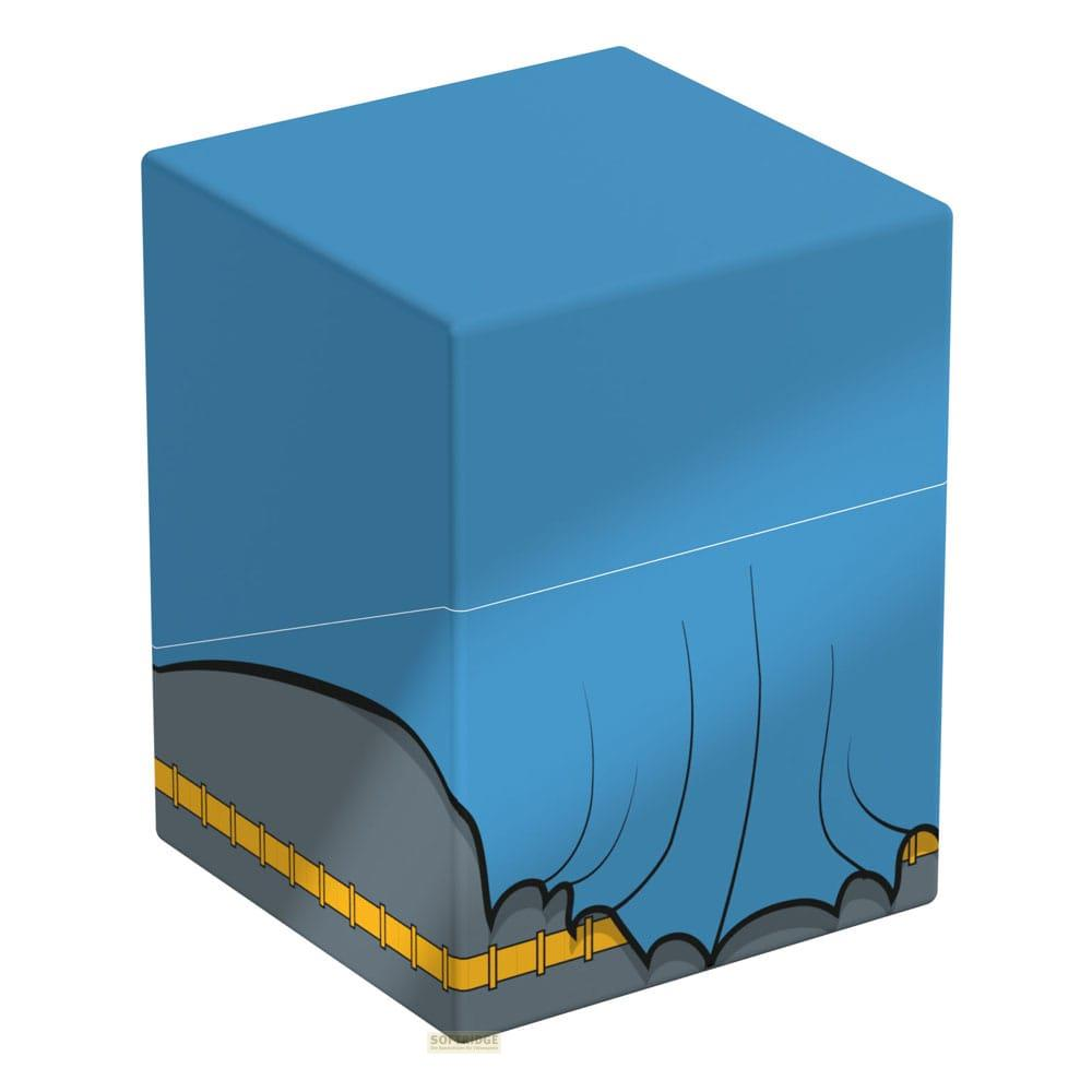 Un cubo blu con design mantello di Batman, cintura gialla e base grigia.
