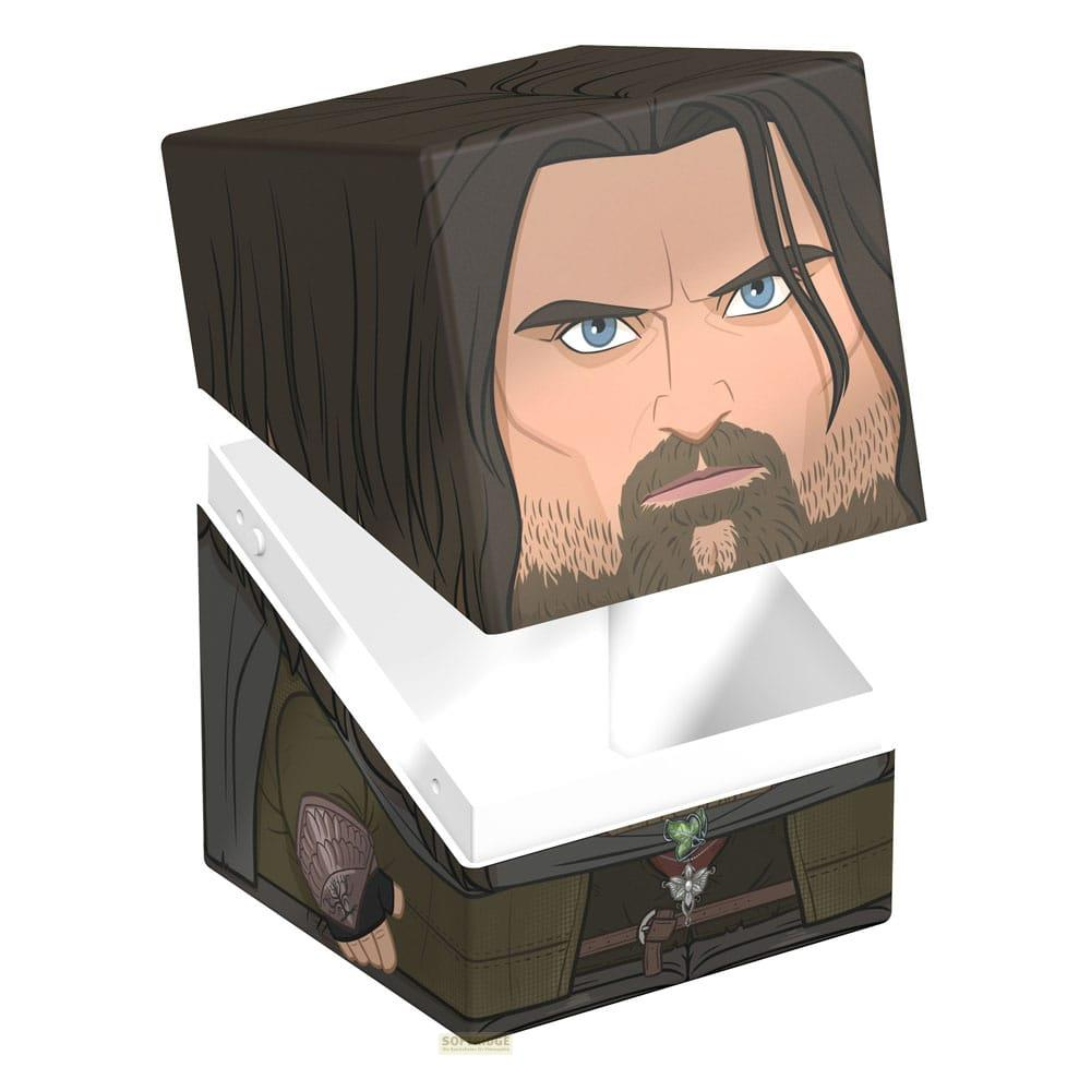 Un cube représentant un homme à barbe et yeux bleus portant une tunique verte.