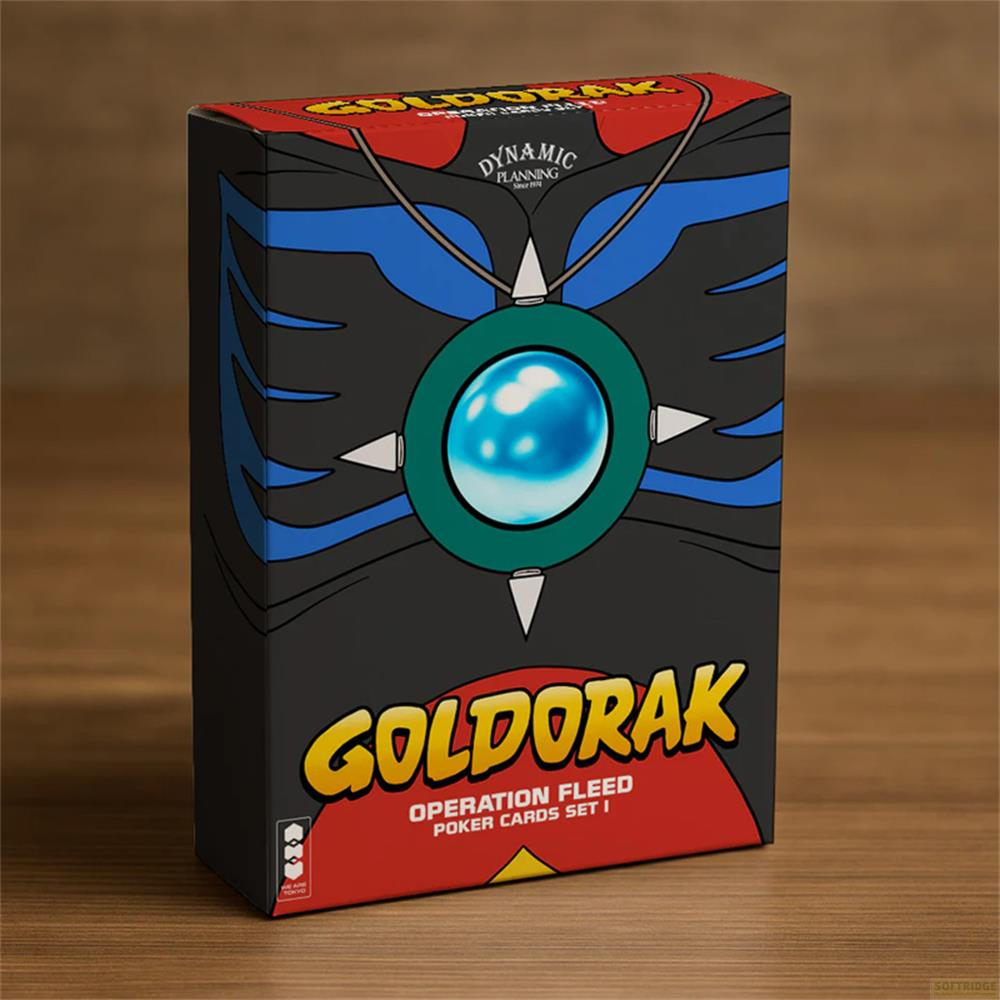 Boàte de cartes à jouer Goldorak avec médaillon gemme bleue et base rouge.