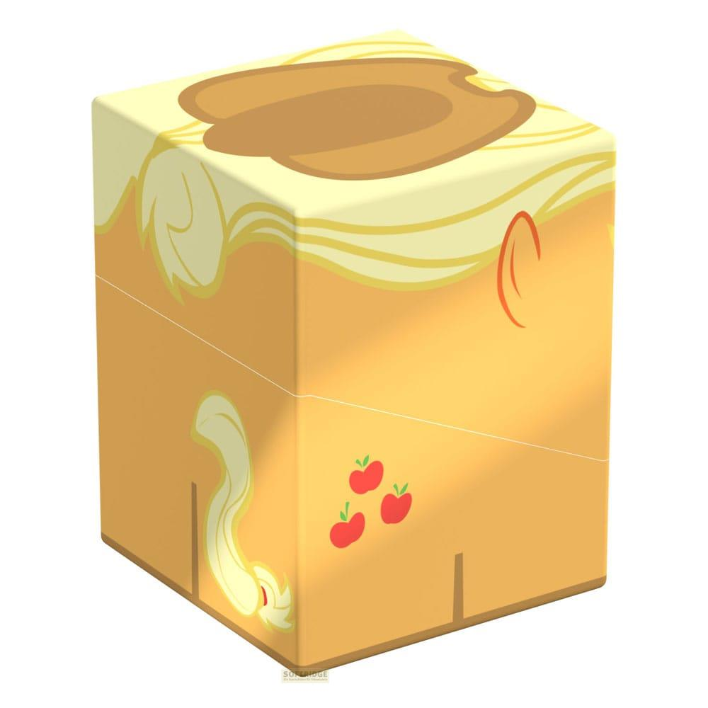 Un cube jaune représentant Applejack et des pommes rouges.
