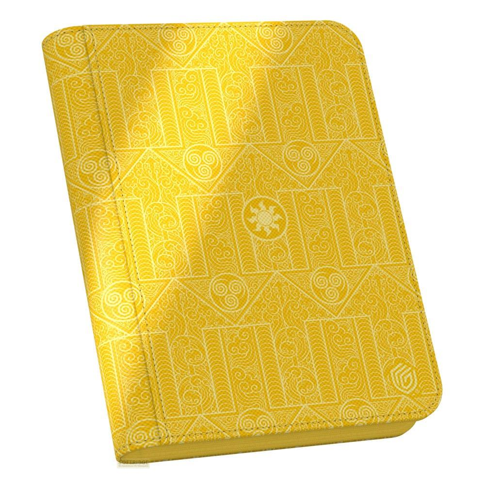 Un livre jaune avec un motif blanc de volutes et de formes géométriques.