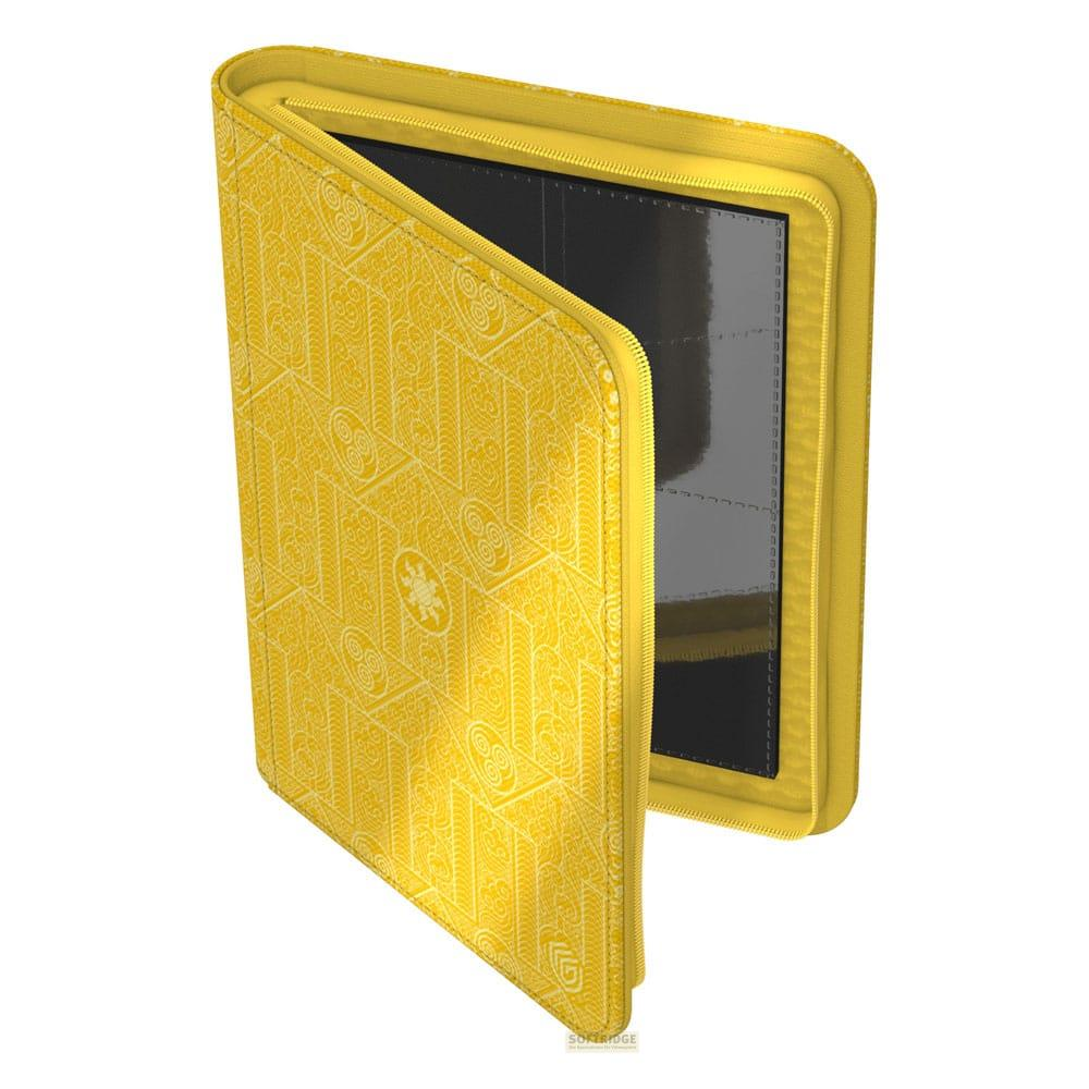 Un classeur jaune à motif, ouvert et vide.