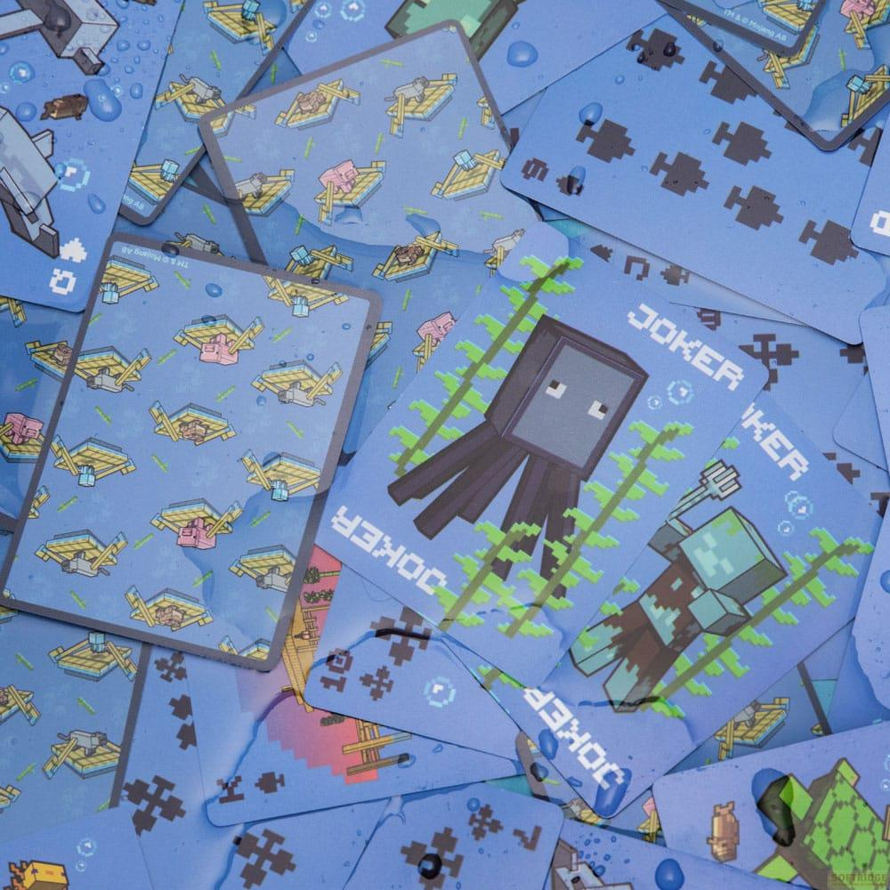 Cartes Joker Minecraft avec un calmar et un zombie sur fond bleu.