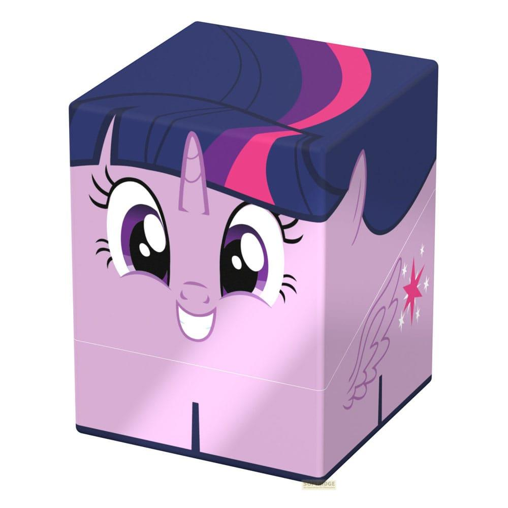 Un cube rose avec le visage de Twilight Sparkle, cheveux violets et détail d'aile.