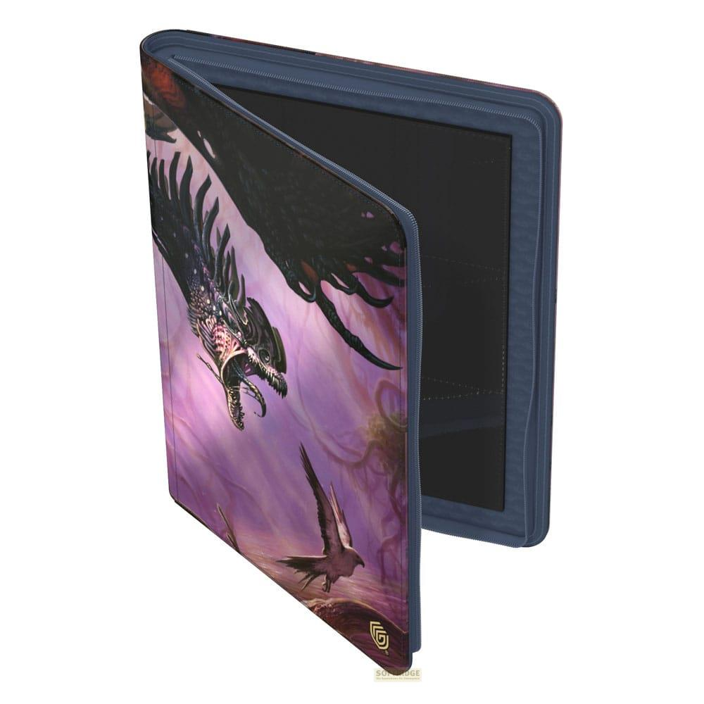 Un classeur bleu avec un dragon et un oiseau sur fond violet.