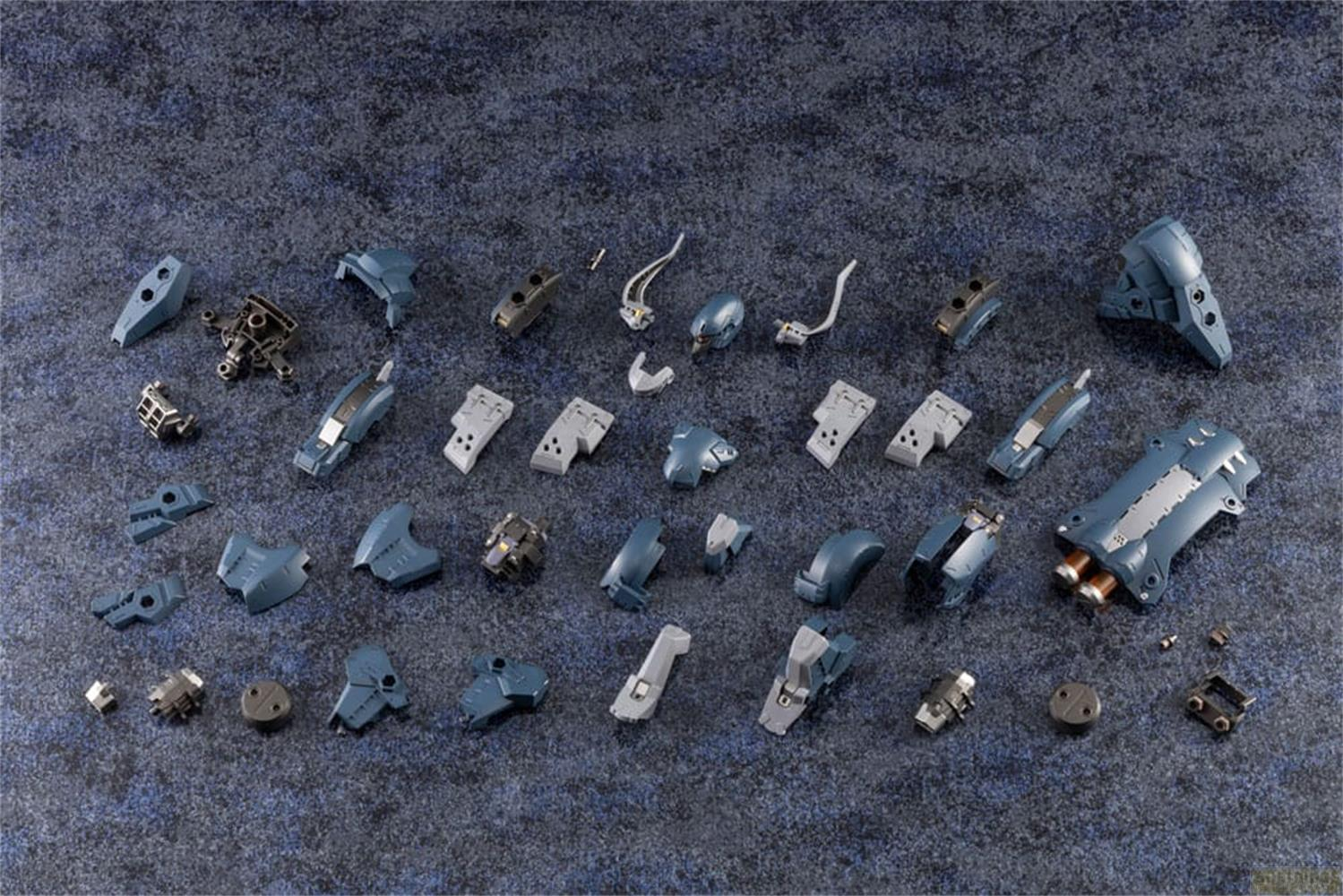 De nombreuses pièces de robot grises et bleues disposées sur fond sombre.