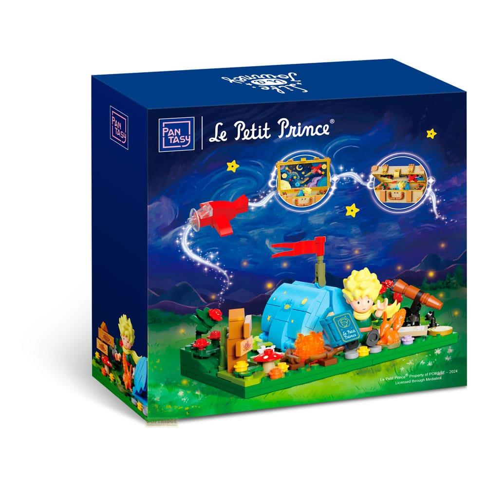 Bauspielzeug-Verpackung mit Figuren aus Der kleine Prinz, Nachtszene.