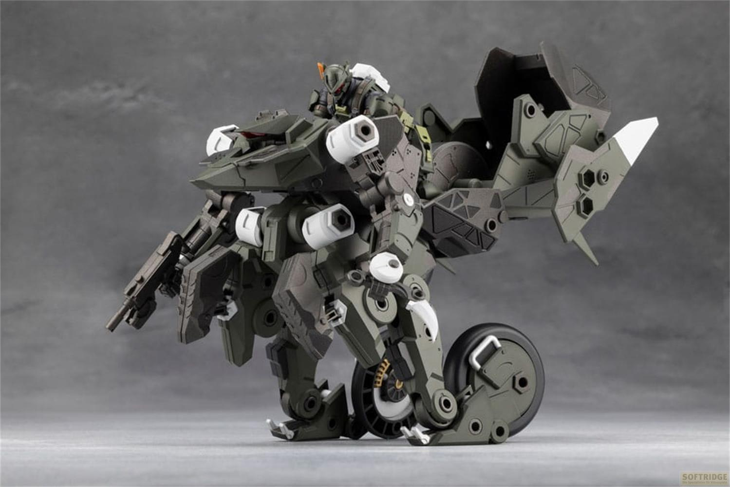Un mech vert foncé avec un pilote, debout sur une roue.