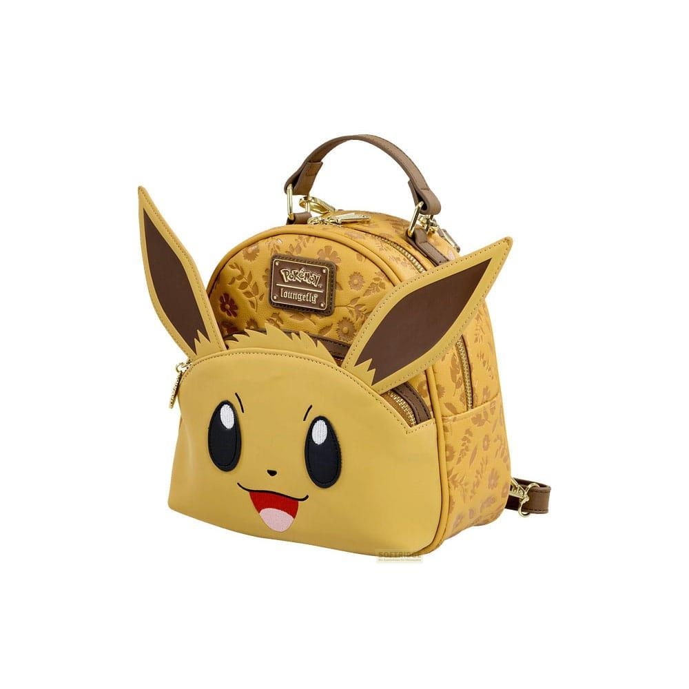 Mochila amarilla con cara y orejas de Eevee, con estampado floral.