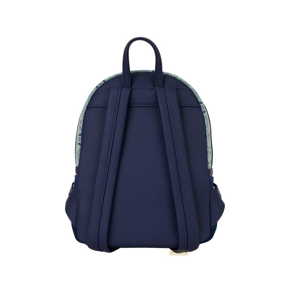 Parte trasera de mochila azul marino con patrón azul verdoso arriba.