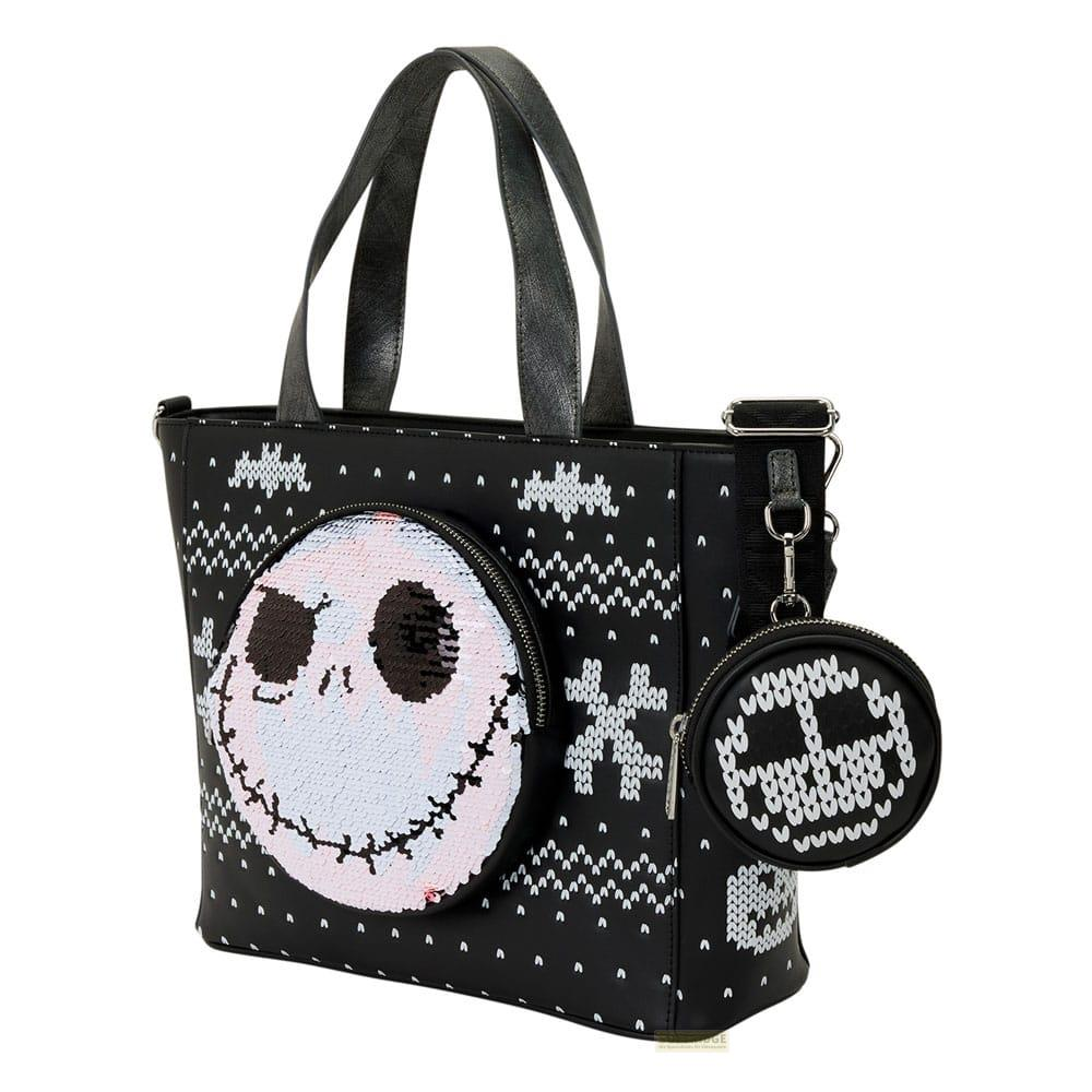 Bolso negro con cara de Jack Skellington y un monedero redondo pequeño.