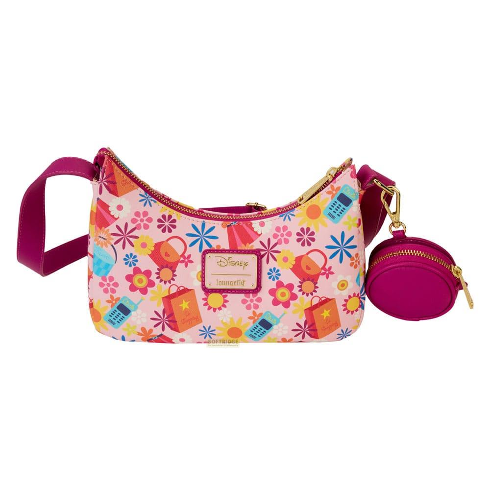 Un bolso rosa con estampado floral, bolsas de compras y teléfonos.