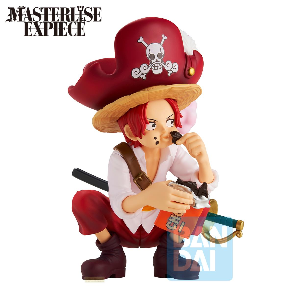 Una figura comiendo chocolate, con sombrero de pirata y espada.
