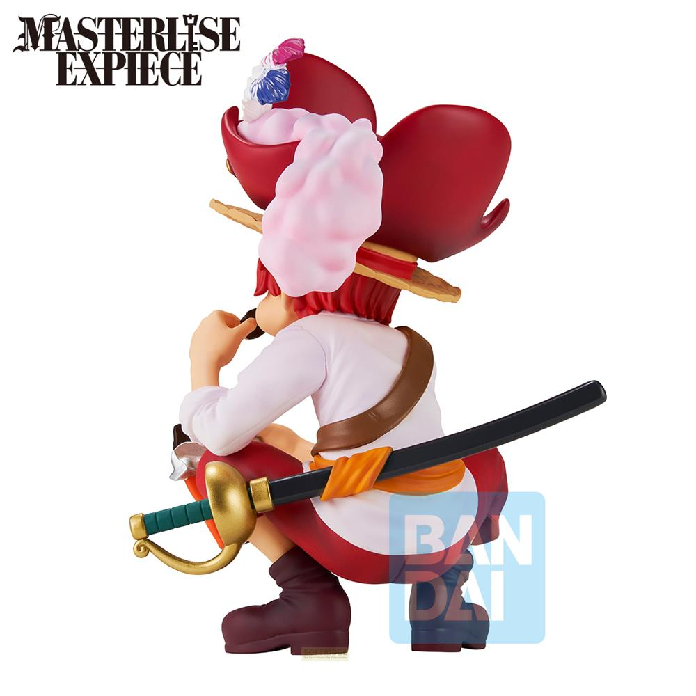 Figura de un pirata de pelo rojo, agachado y portando una espada.