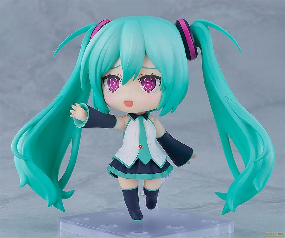 Una figuretta Nendoroid di Hatsune Miku con capelli color tiffany e cuffie rosa.