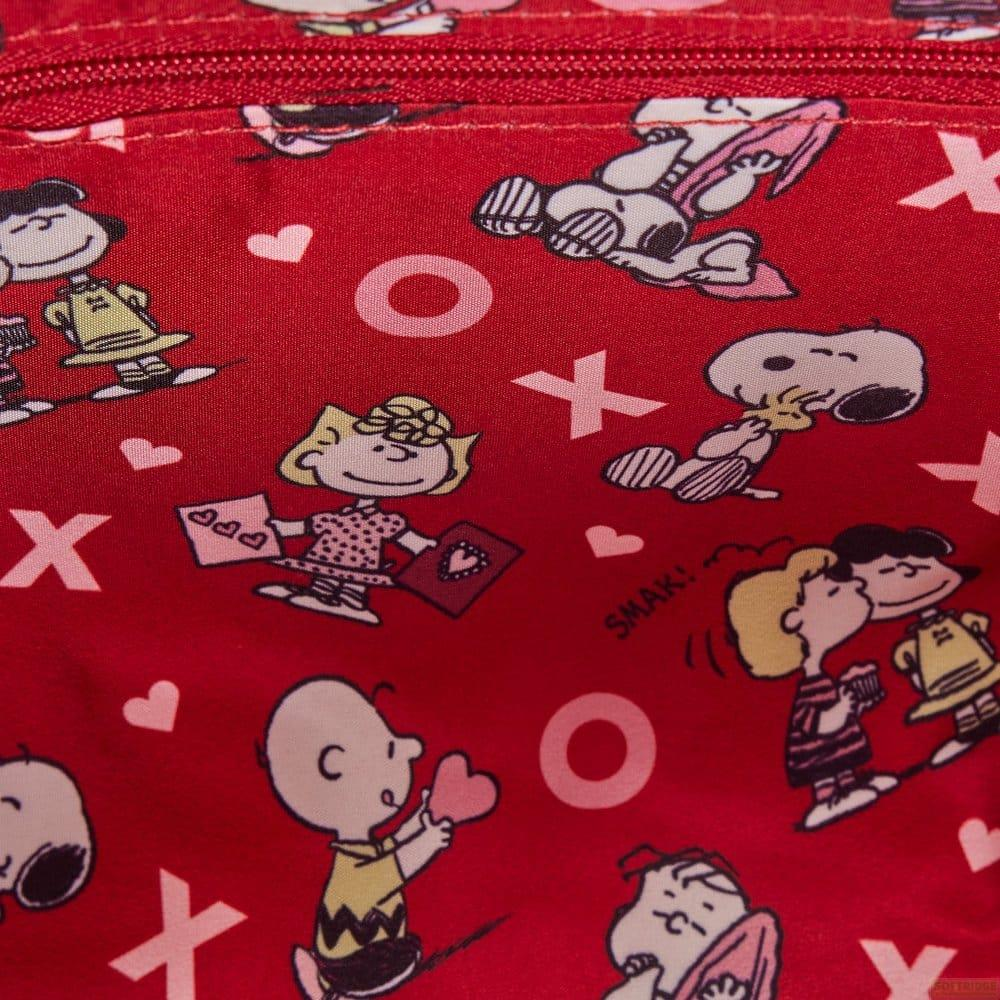 Personajes de Peanuts sobre fondo rojo con corazones y patrones X/O.